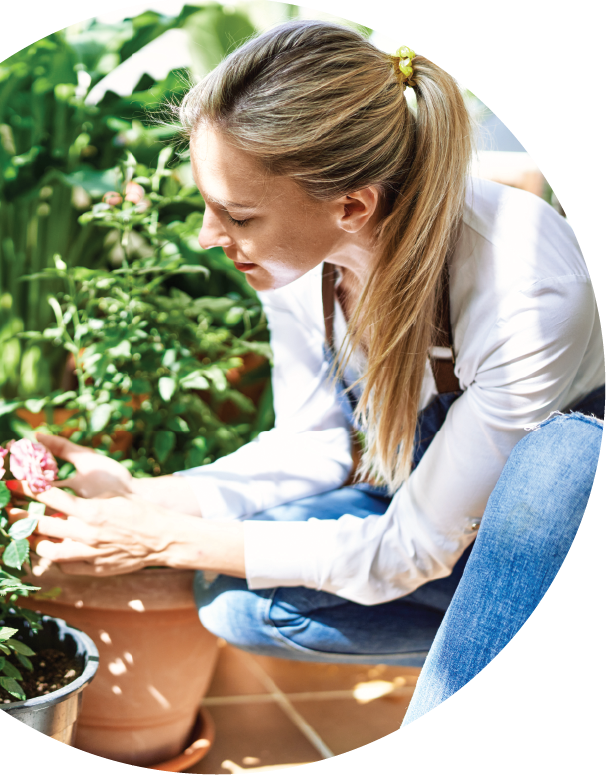 lady messing with flowers